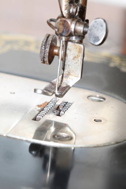 istock Pad of the old Singer sewing machine close-up 904916404