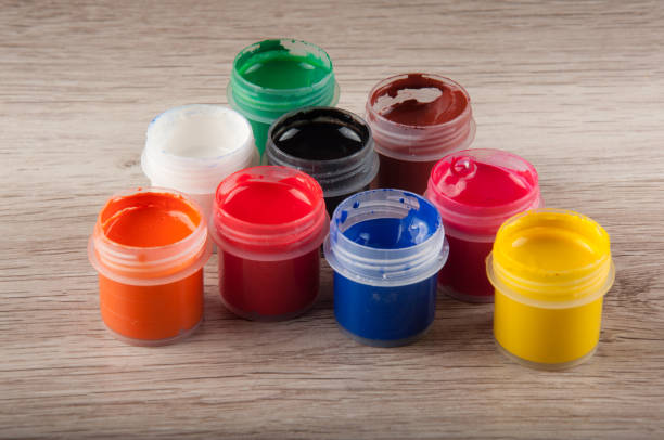 istock Several jars of gouache paints on table 904916432