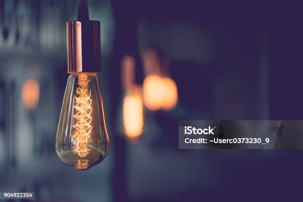 Vintage Electric Lightdecorative Antique Edison Style Light Bulbs In Coffee Shopvintage Tone Stock Photo - Download Image Now