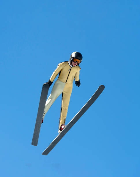 istock Front View of Young Male Ski Jumper Practicing at 30 m Hill 904925826