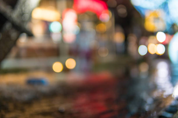 istock Image of shopping place with light blurred bokeh abstract background. Blurred colorful circles on light holiday background. 904930172