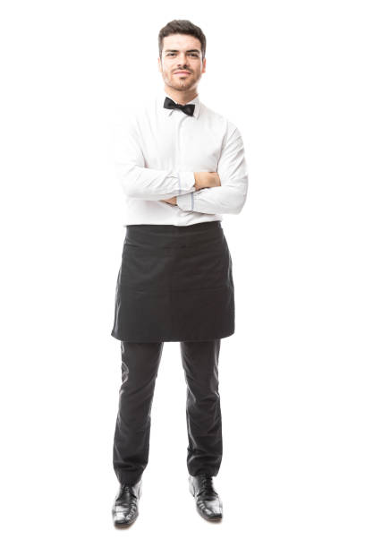 istock Confident waiter with arms crossed 904936936