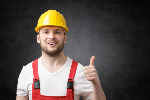 istock Happy worker showing thumbs up sign 904943266