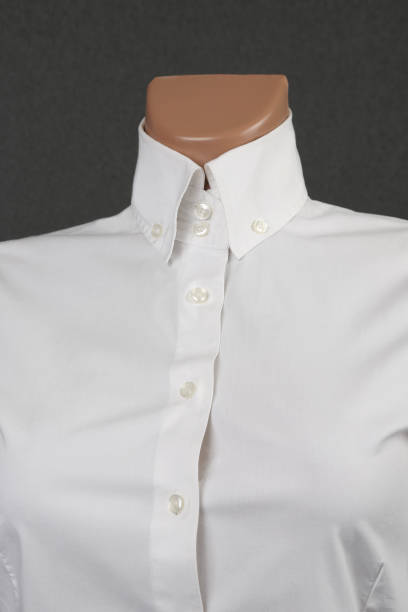 istock women's classic white shirt on gray background 904954454