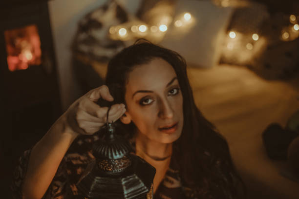 istock woman holding oriental lantern 904957650