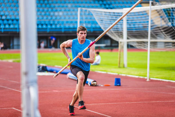 Pole vault competition stock photo