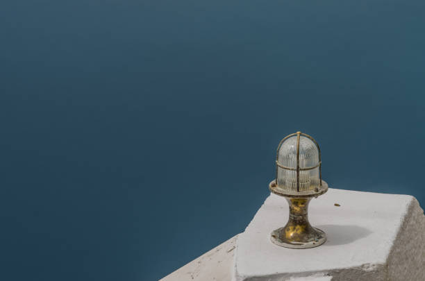 istock lamp on terrace by the sea 904961412