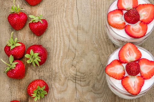 Milk desserts with fresh strawberries