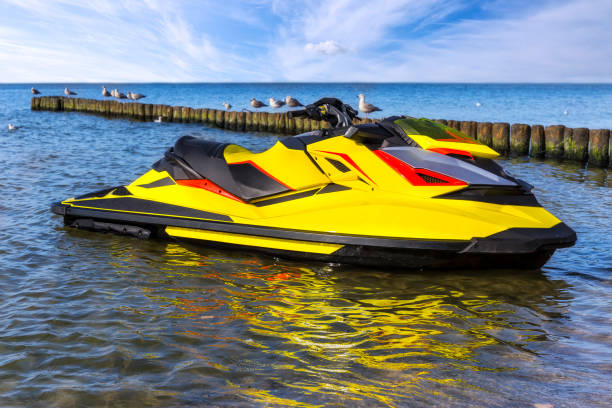 istock Blue sea and a jet ski floating on the sea 904971514
