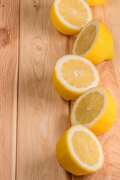 istock lemons in position geometric on wooden table 904975850