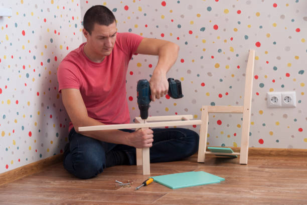 istock assembly of furniture 904980472