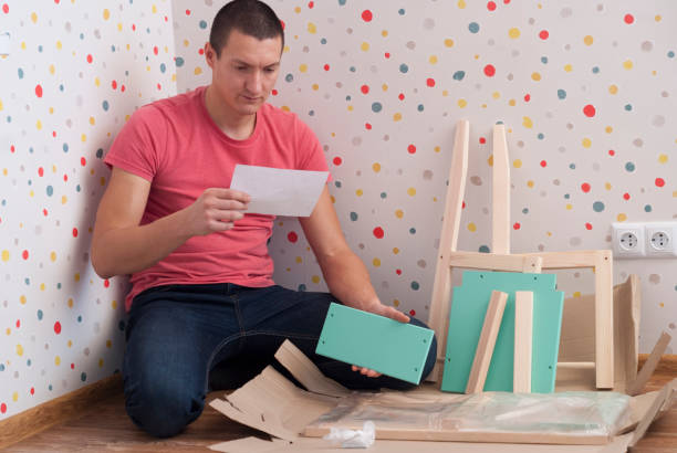istock assembly of furniture 904980476