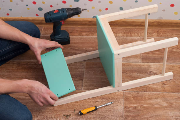 istock assembly of furniture 904980632