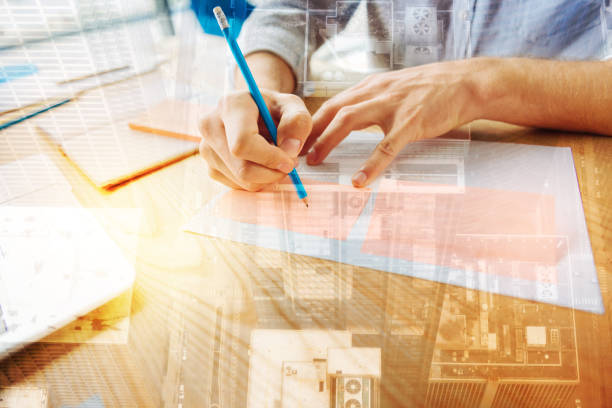 istock Close up of male hands while drawing 904981230