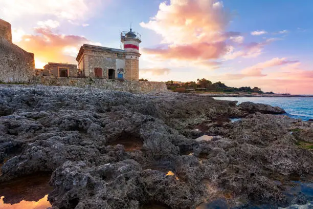 Photo of The castle of Brucoli and little lighthouse, Syracuse, Sicily, Italy