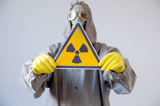istock People in gas masks 904996516