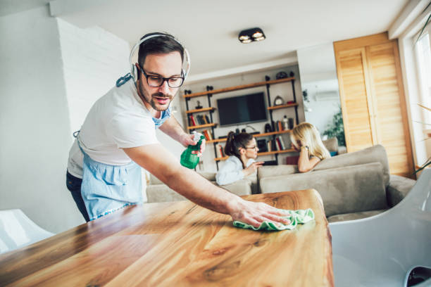 istock Husband housekeeping and cleaning concept 904997198
