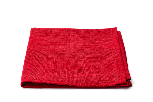 Red textile napkin on white stock photo