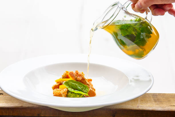 istock Fish soup with salmon and clear broth. 905010844