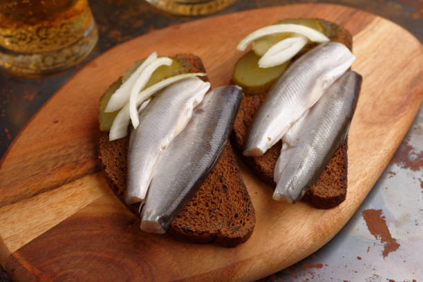 istock Sandwiches with smelt fish and beer 905011824