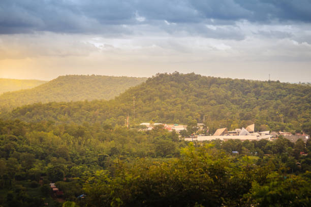 istock Peaceful forest and mountains over Chong Mek checkpoint terminal, the land bridge permanent border pass to Vang Tao village, Pakse, Champasak, Laos. View from Wat Phu Prao, Ubon Ratchathani, Thailand. 905017998