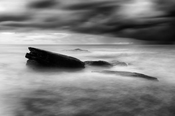 istock Sea Bungan Dark Rock BW 905024722