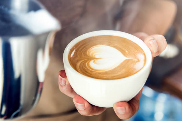 istock Barista making heart shape latte art coffee 905028990