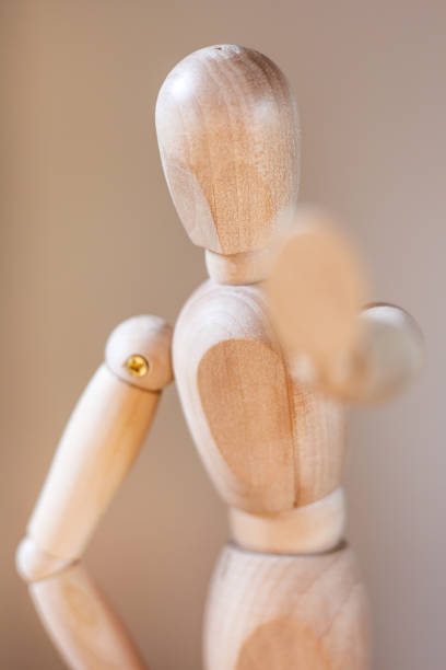 istock Wooden mannequin isolated on white background 905041118