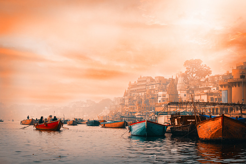 View of the Ganges river and Varanasi at sunrise. India