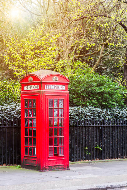 istock Traditional red telephone box in London, UK 905055410