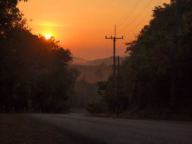 istock Autumn sunrise road 905064640