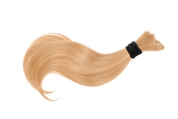 istock Blond hair on white background 905065588
