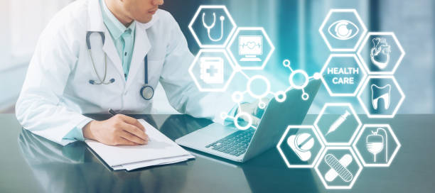 istock Medical concept - Doctor on Computer with Icons 905072362