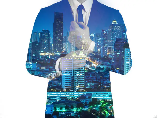 Double exposure of success business man city background.time for business.