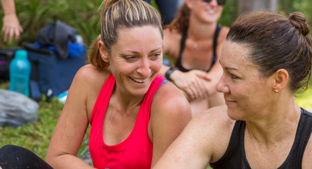 istock Exhausted Mature Women After Outdoor Exercise Class 905076108