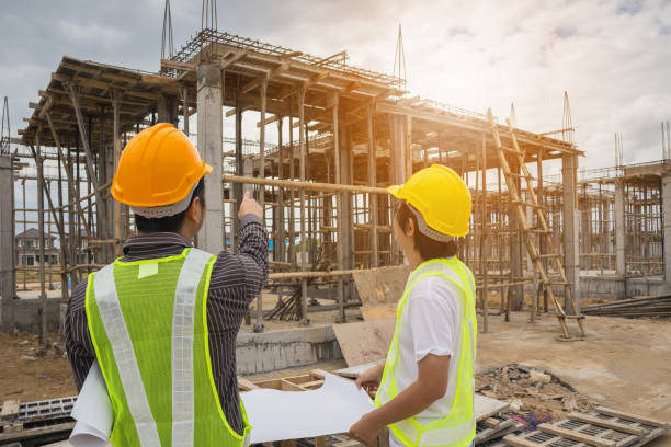 istock Asian business man construction engineer workers at house building site 905076482