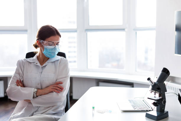 istock Woman doctor working in the lab 905087676