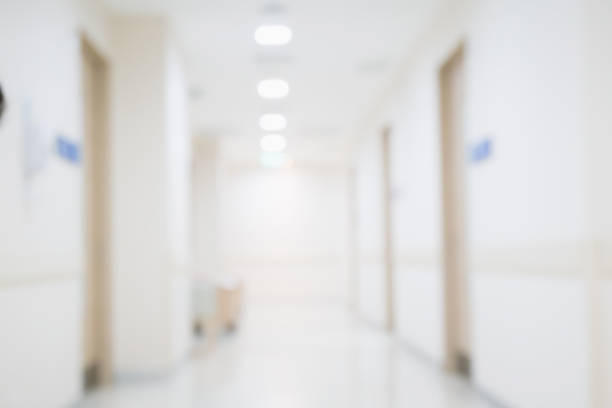 istock Abstract blur hospital clinic interior medical background 905090736