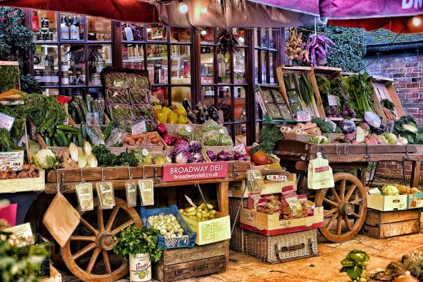 outdoor grocery greengrocers store with fruit and vegetables displayed - 4742 imagens e fotografias de stock