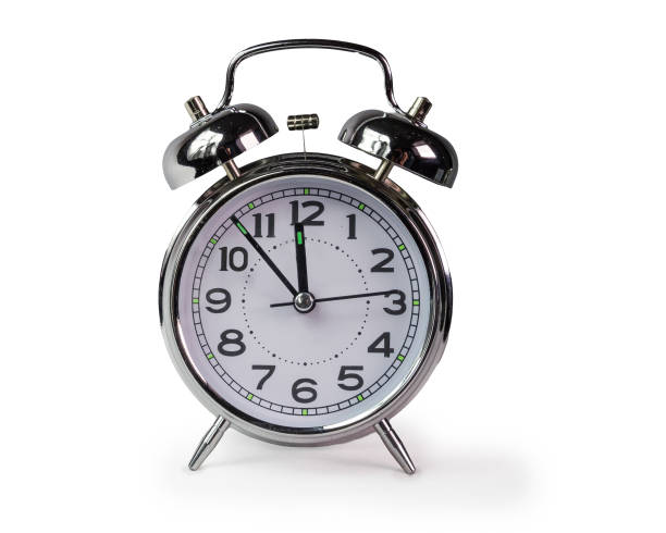 istock spring time clock flowers nature space for your text , background 905102040