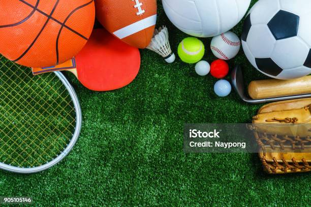 Sports Equipment On Green Grass Top View Stock Photo - Download Image Now - Sport, Backgrounds, Sports Ball