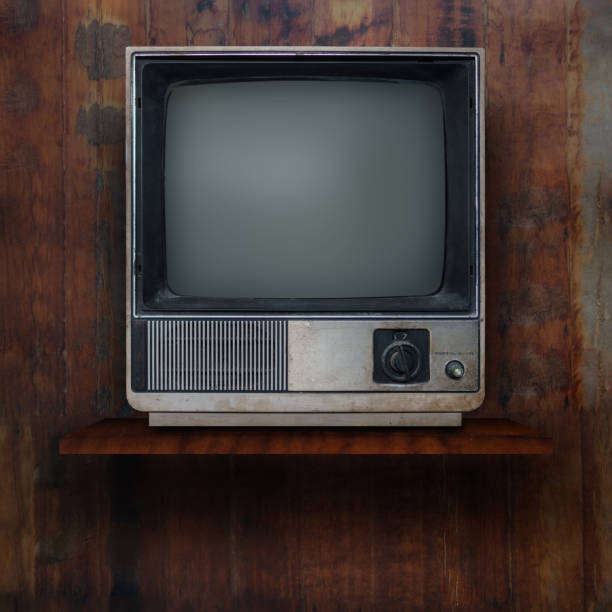 istock Vintage tv on wood shelf background 905106276