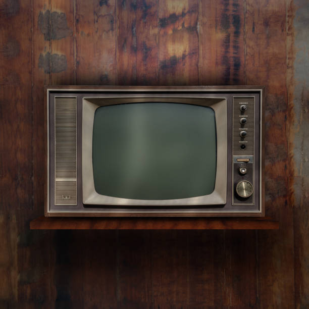 istock Vintage tv on wood shelf background 905106292