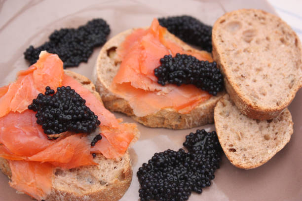 istock Toasts with smoked trout and lump eggs 905107408