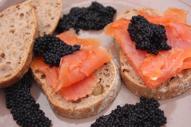 istock Toasts with smoked trout and lump eggs 905107480