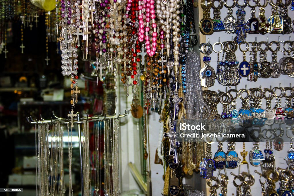 colors of Israel Closeup of religious objects  in a souvenirs shop in the bazaar of the old city of Jerusalem Ancient Stock Photo