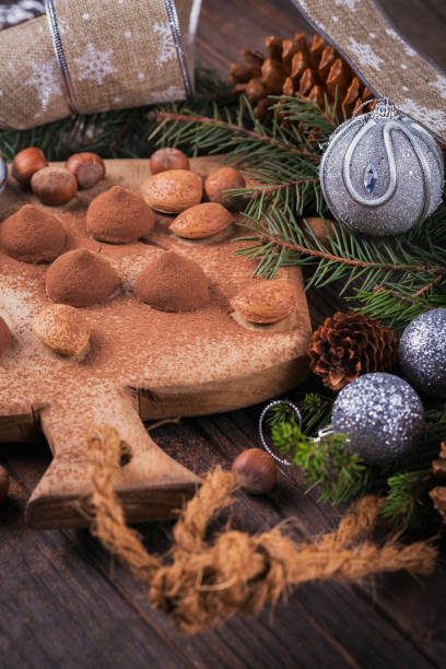 istock Homemade chocolate truffles, nuts, almonds and cocoa powder 905118440