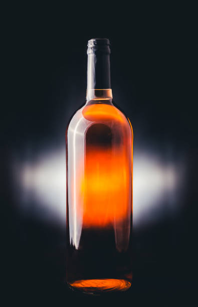 istock Bottle of wine on dark background. 905122454