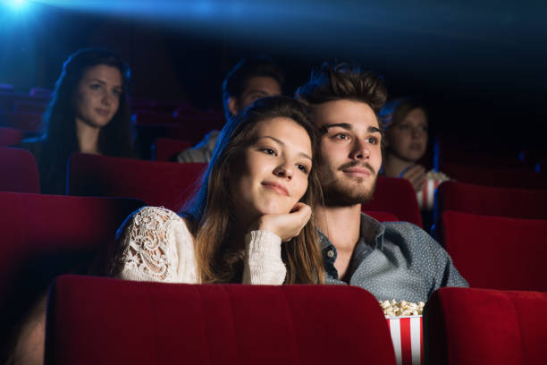 istock Young loving couple at the cinema 905126576