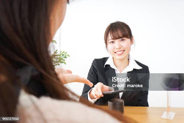 Young Woman Shopping With Electronic Money Stock Photo - Download Image Now - Adult, Adults Only, Asian and Indian Ethnicities